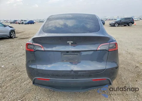 2025 Tesla Model Y from USA, damaged, VIN 7SAYGDED2SF256939